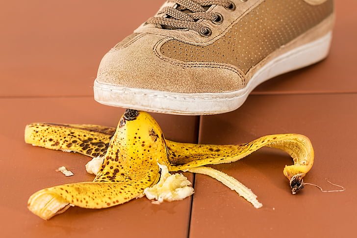 banana peel under person shoe