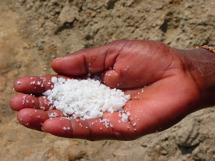 person holding salt