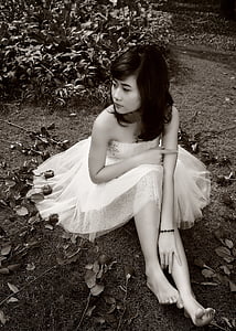 grayscale photography of woman in white cocktail dress