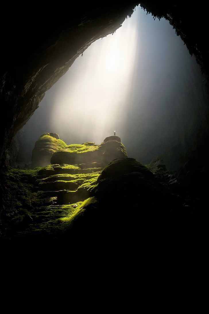 grass covered cave