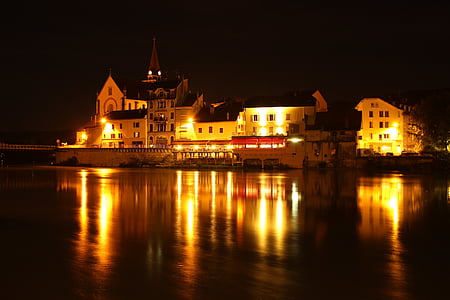 building near body of water photograph during nighttime wallpaper