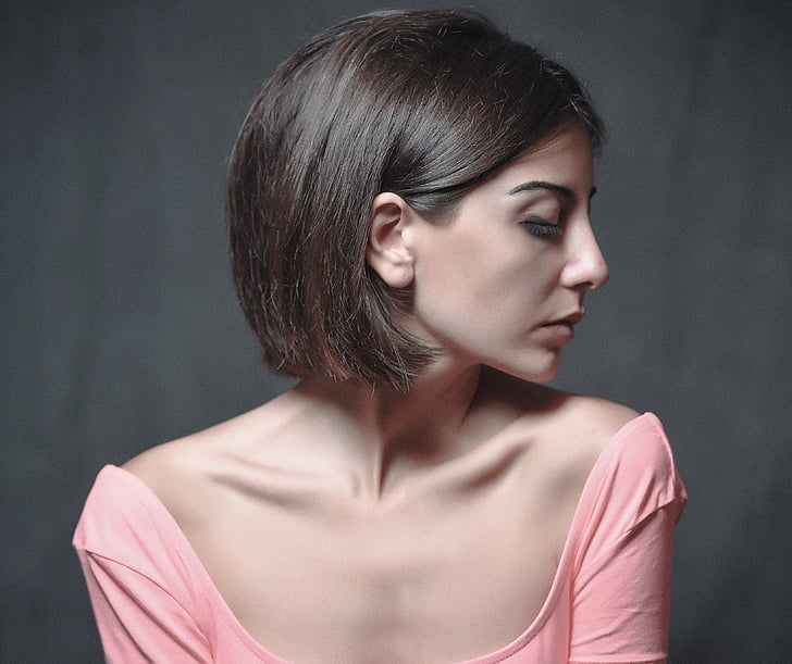 woman wearing pink scoop-neck top photo