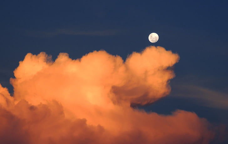 view of nimbus cumulus clouds with full moon
