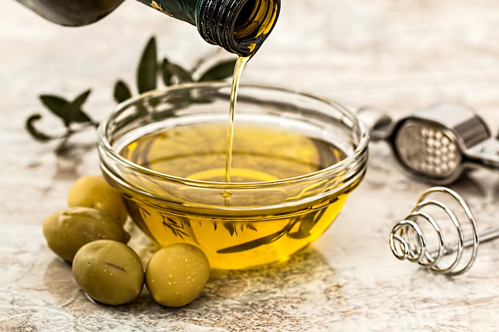 Royalty-Free photo: Round clear glass bowl with olive oil | PickPik