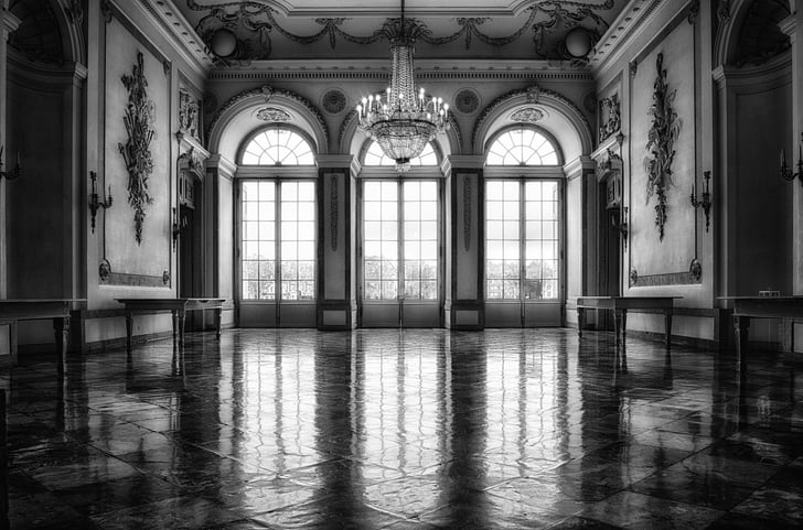 grayscale photo of empty hall