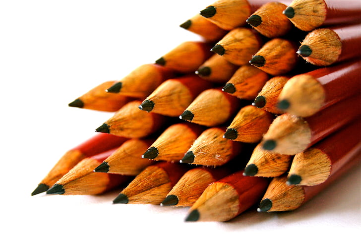 selective focus photography of pile of pencils