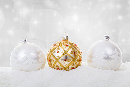 three gray and gold baubles