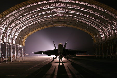 silhouette of jet during night time
