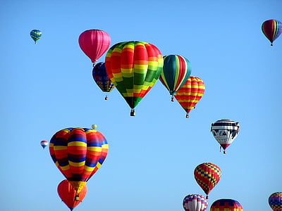 assorted-color hot air balloons floating at daytime