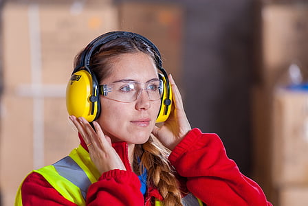 woman wearing yellow headphones
