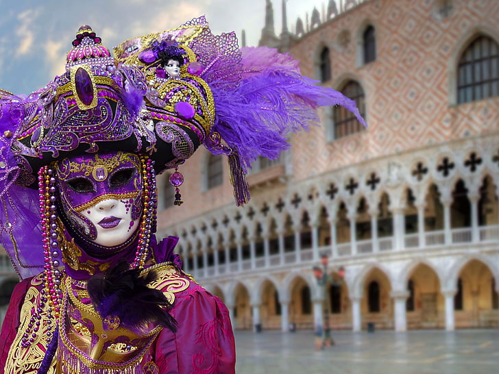 person wearing purple masquerade mask