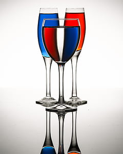 clear wine glass and clear glass champagne flutes