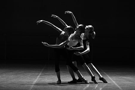 grayscale photo of three women doing a contemporary dance position