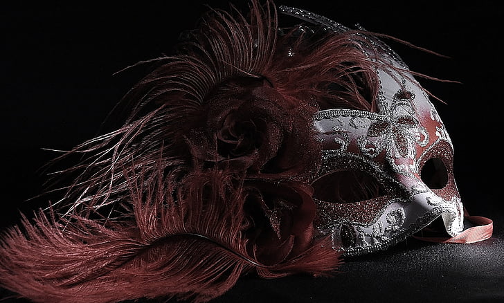 women's white and red mask