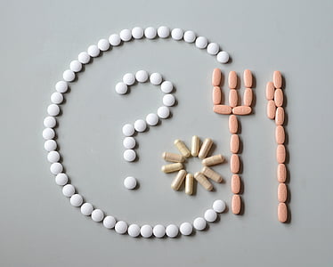 white, pink, and brown medication pill decors