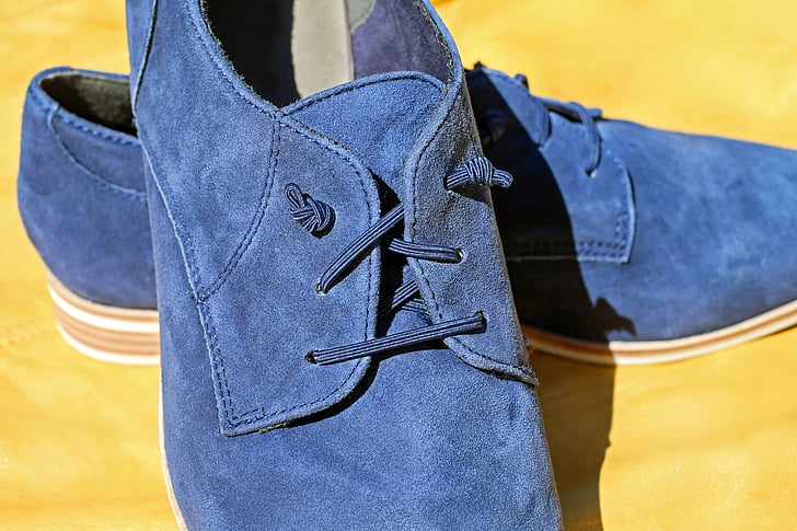 pair of blue suede shoes
