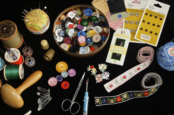Embroidery Accessories for a Variety of Colors, Such As Yarn, Needle and  Buttons Brought Together Stock Photo - Image of buttons, fashion: 152363294