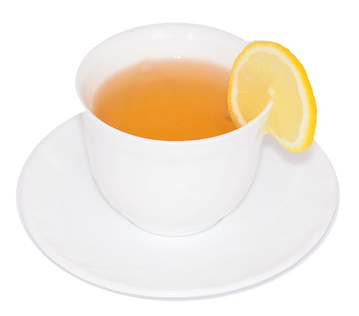 white ceramic teacup with lemon tea