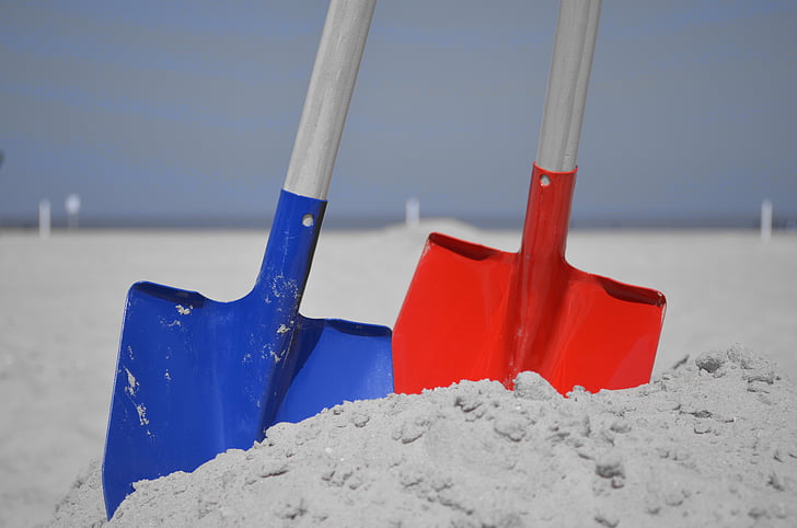two blue and red shovels