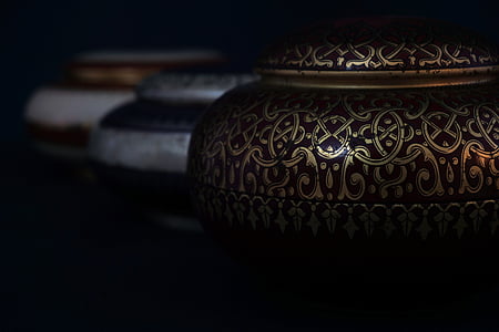 photo of brown urn