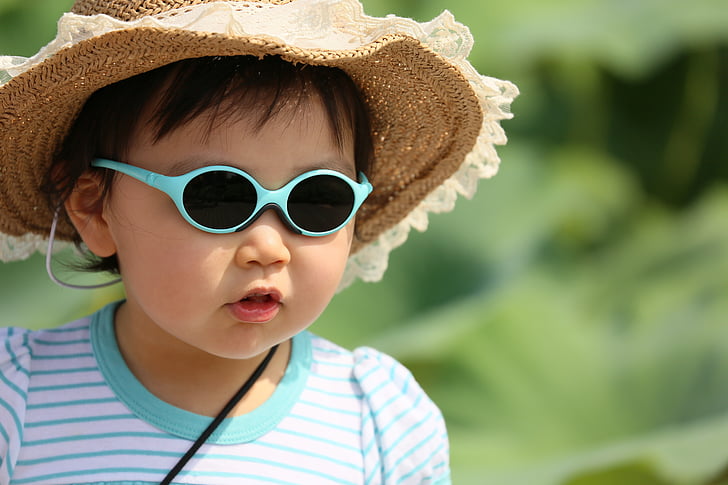 girl wearing stripe shirt, sunglasses selected photograghpy