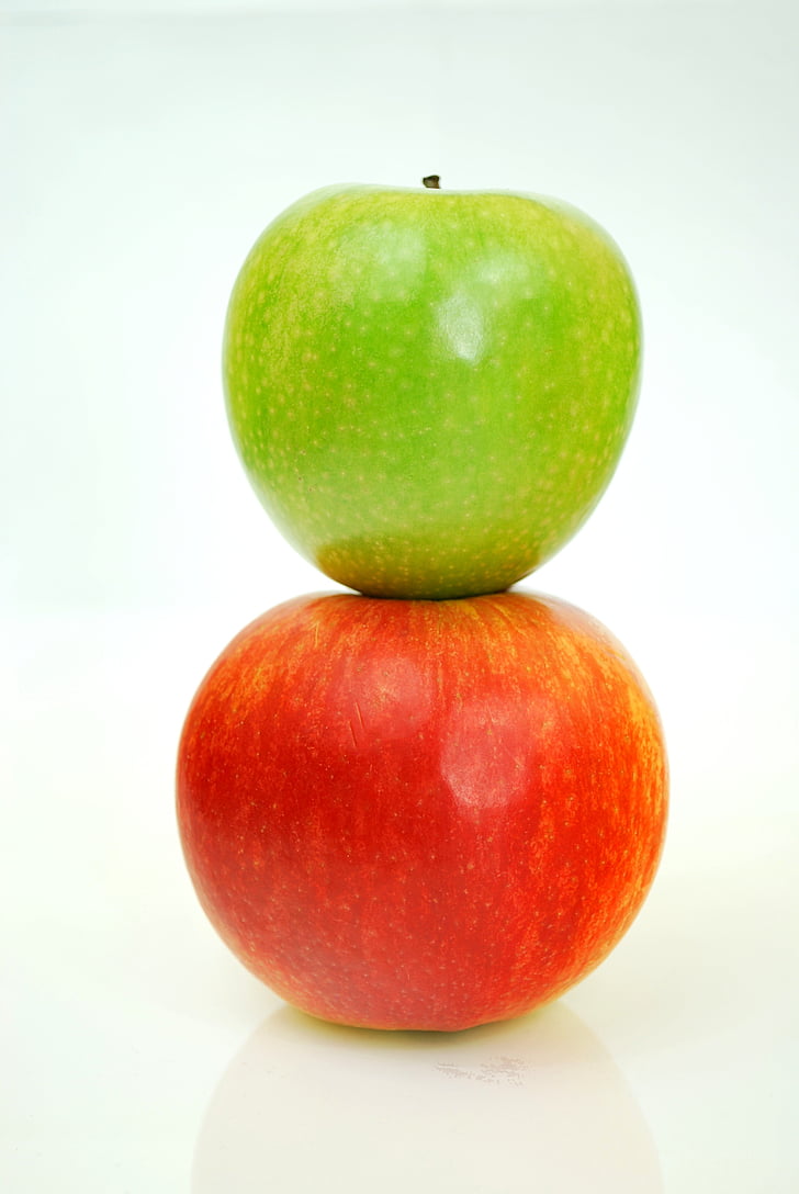 two green and red apple fruits photo