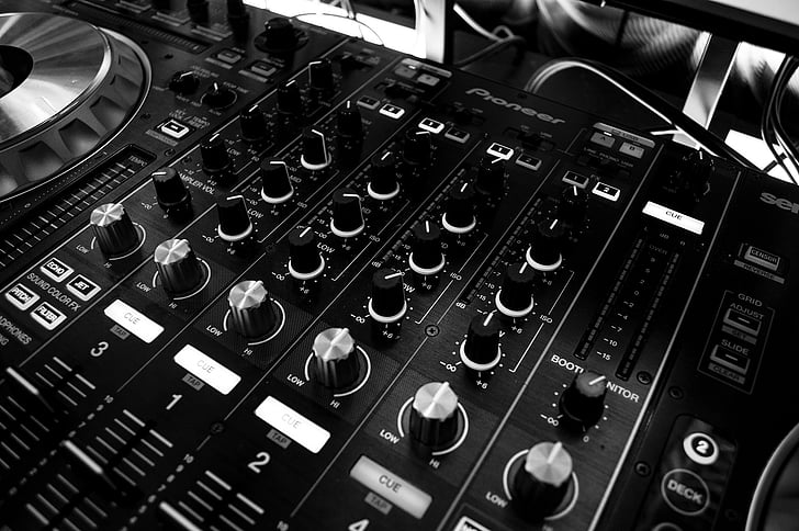 grayscale photography of black DJ controller