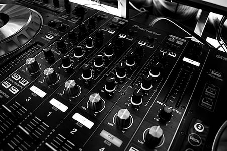 grayscale photography of black DJ controller