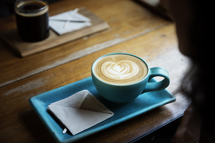 cappuccino in blue ceramic cup