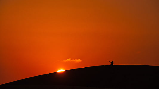 silhouette of person in the mountain
