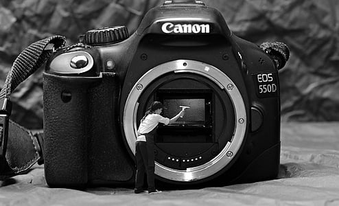 grayscale photography of Canon EOS 550D camera