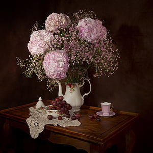 pink and white petaled flowers with vase