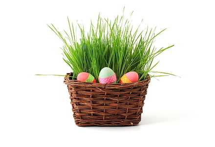 easter eggs on brown wicker basket