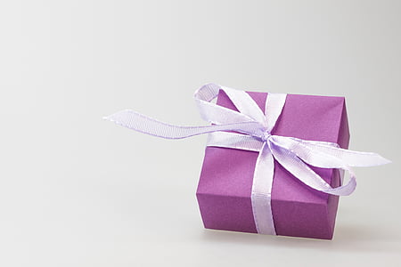 purple box with white ribbon