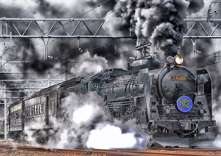 grayscale of train with smoke