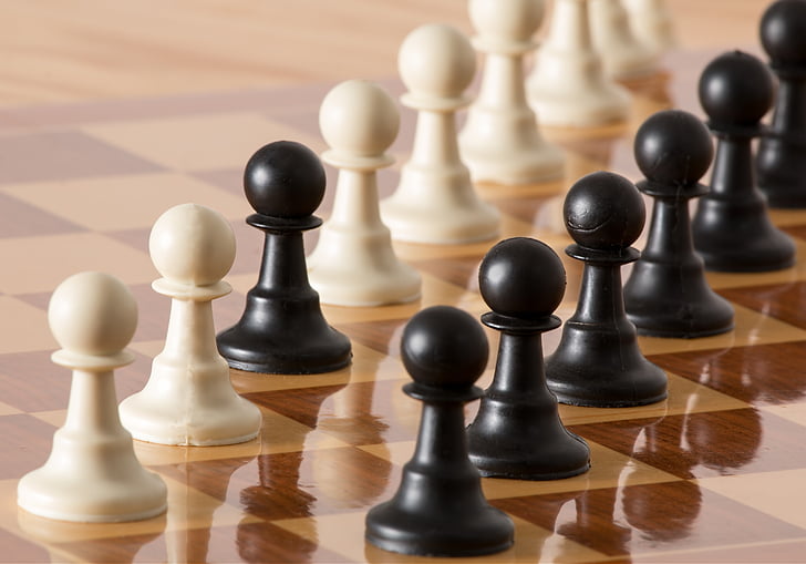 closeup photo of chess pieces on board