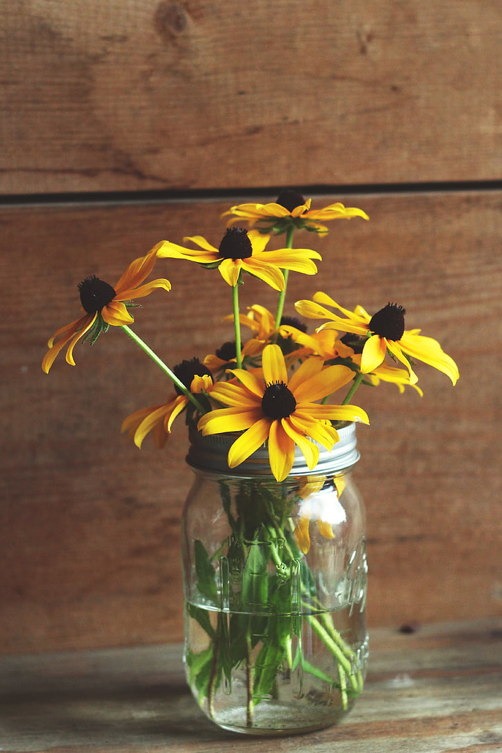 yellow flowers on vase