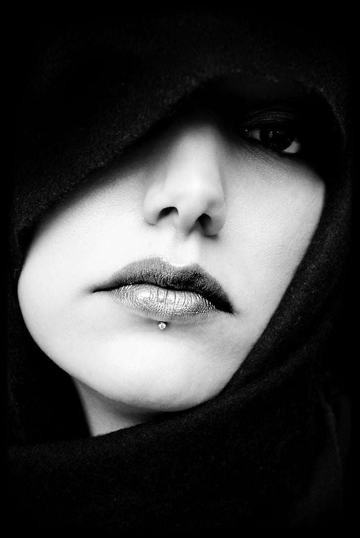 grayscale photo of woman wearing black scarf