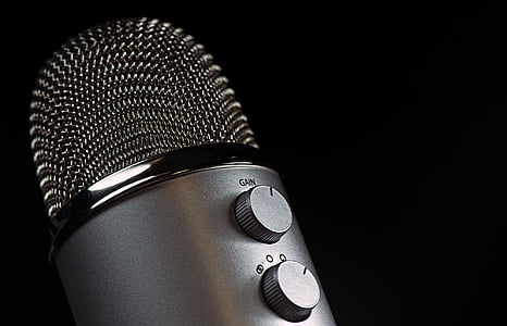gray condenser microphone with black background