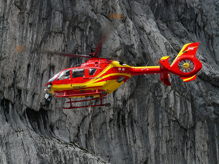 red and yellow helicopter