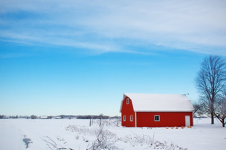 landscape photograph of red barn house during winter