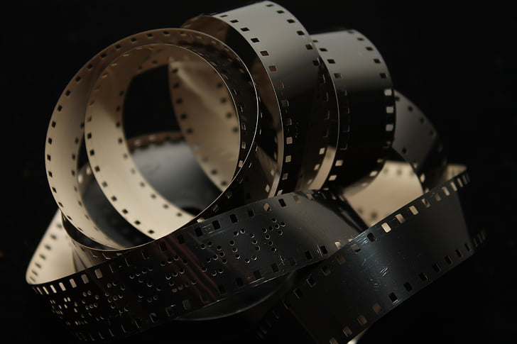 closeup photo of white and black camera film