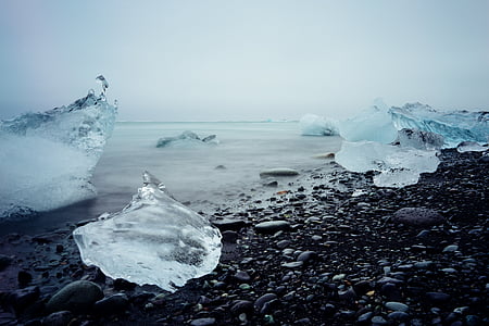 block of ices on seashore