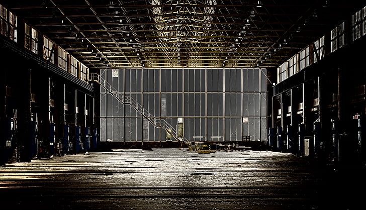grey iron warehouse with dim light