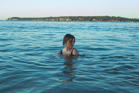 woman on body of water