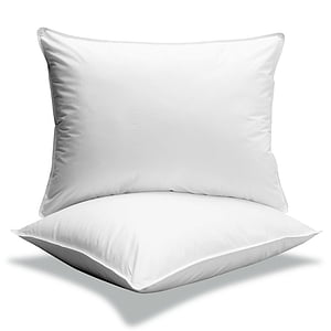 two white throw pillows