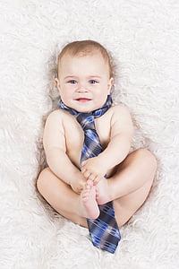 baby wearing blue necktie
