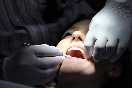 woman undergoing dental procedure