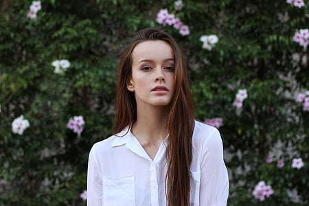 brown haired woman in white dress shirt