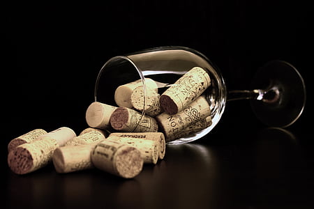brown cork bottler stopper in clear wine glass
